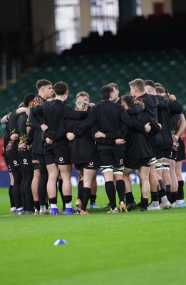 200226 - Wales Captain’s run - The Wales team huddle up during Captain’s run ahead of their Six Nations match against Scotland