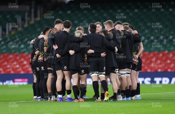 200226 - Wales Captain’s run - The Wales team huddle up during Captain’s run ahead of their Six Nations match against Scotland