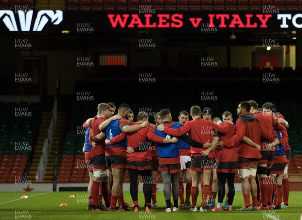 310120 - Wales Captain's Run, Principality Stadium - The Wales Squad huddle together during training ahead of the opening Guinness Six Nations match against Italy