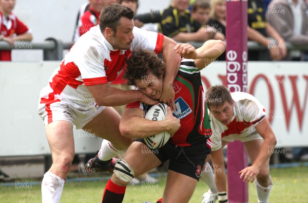 13.06.09 - Wales Dragonhearts v England Lionhearts, 2009 Rugby League Conference Home Nations Championship -  Wales' Daniel Smith is tackled by Englands Jaques Steynberg 