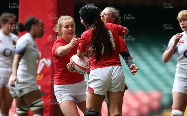 300419 - Wales Women Emerging Talent v England U18s Development Group - Lauren Smyth of Wales celebrates scoring a try
