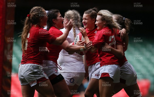 300419 - Wales Women Emerging Talent v England U18s Development Group - Mali Jones of Wales celebrates scoring a try with team mates