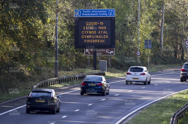 221020 - Picture shows a sign informing motorist driving into Cardiff of the Firebreak lockdown starting in Wales tomorrow (23rd October) at 6pm