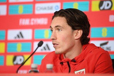 300326 - Harry Wilson of Wales speaks to the press ahead of the upcoming match against Northern Ireland