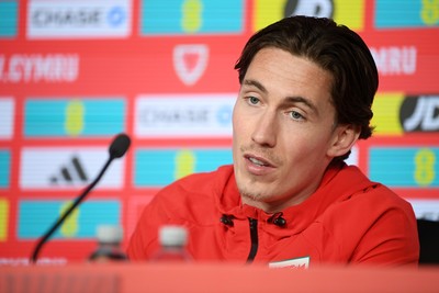 300326 - Harry Wilson of Wales speaks to the press ahead of the upcoming match against Northern Ireland