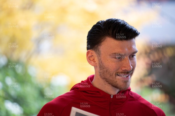 141122 - Wales Football Media Interviews - Kieffer Moore of Wales during a media interview session ahead of the Wales team departure for the FIFA World Cup in Qatar