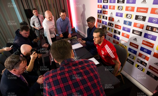 181119 - Wales Football Press Conference - Wales' Gareth Bale takes his seat before he speaks to the media during press conference ahead of the Euro 2020 Qualifier against Hungary 