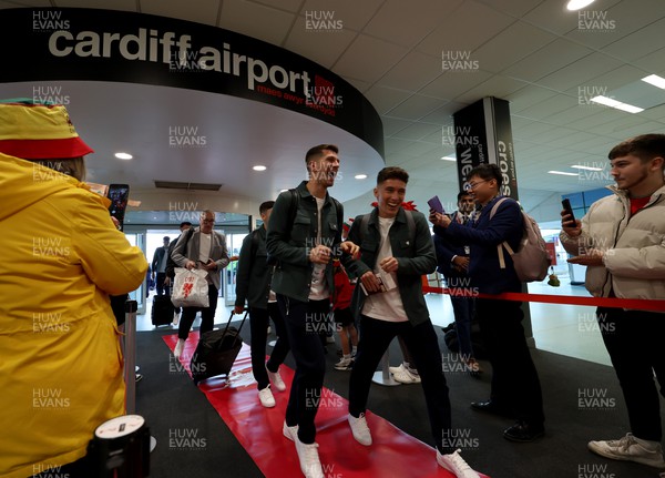 151122 - Wales Football Squad Departs For Qatar From Cardiff Airport - Chris Mepham and Harry Wilson