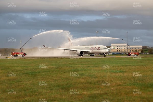 151122 - Wales Football Squad Departs For Qatar From Cardiff Airport - Plane carrying the Welsh squad under water jets