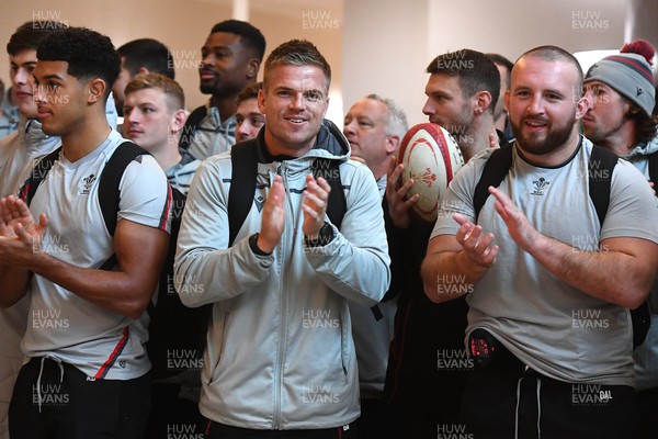 151122 - Wales Football Squad Depart for FIFA World Cup - Wales rugby players Garth Anscombe and Dillon Lewis applaud the Wales football squad as they depart for Qatar