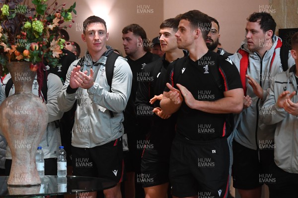 151122 - Wales Football Squad Depart for FIFA World Cup - Wales rugby players Josh Adams, Joe Hawkins and Kieran Hardy applaud the Wales football squad as they depart for Qatar