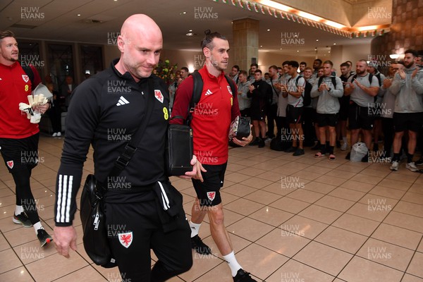 151122 - Wales Football Squad Depart for FIFA World Cup - Robert Page and Gareth Page leave the Vale Resort as Wales rugby players applaud the Wales football squad as they depart for Qatar