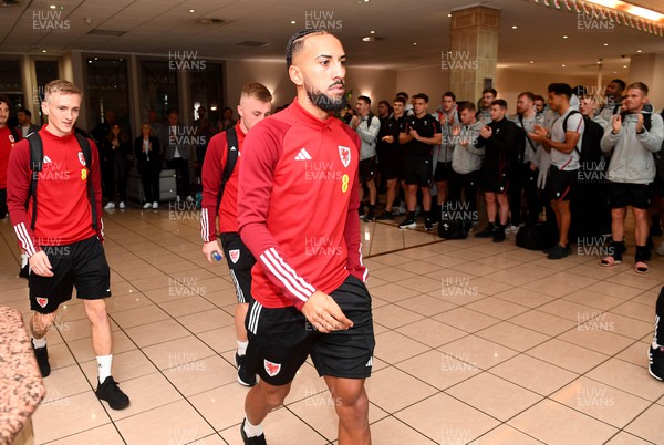 151122 - Wales Football Squad Depart for FIFA World Cup - Sorba Thomas leave the Vale Resort as Wales rugby players applaud the Wales football squad as they depart for Qatar