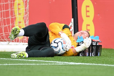 031026 - Wales Football Training - David Cornell hits his head on water bottles during training ahead of their upcoming Nations League match against Denmark