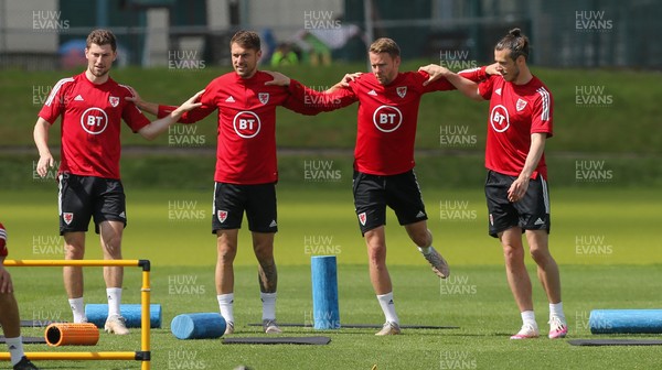 040621 - Wales Football Squad Training Session - Left to right, Ben Davies, Aaron Ramsey, Chris Gunter and Gareth Bale during a Wales training session ahead of their friendly match against Albania 