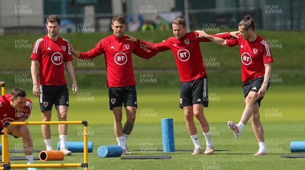 040621 - Wales Football Squad Training Session - Left to right Ben Davies, Aaron Ramsey, Chris Gunter and Gareth Bale during a Wales training session ahead of their friendly match against Albania 