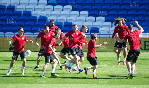 050918 - Wales Football Training Session - Wales players warm up during a Wales Football Training session at Cardiff City Stadium ahead of the match against Republic of Ireland