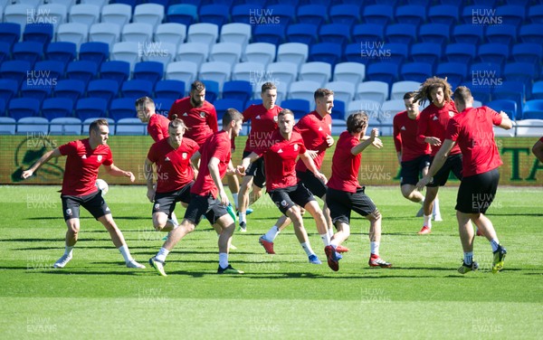 050918 - Wales Football Training Session - Wales players warm up during a Wales Football Training session at Cardiff City Stadium ahead of the match against Republic of Ireland