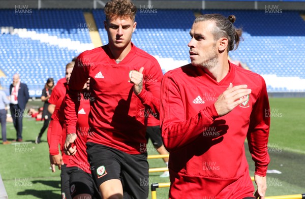 050919 - Wales football training session, Cardiff City Stadium - Wales' Gareth Bale and Joe Rodon in warm up during Wales training session ahead of their Euro Qualifying match against Azerbaijan 