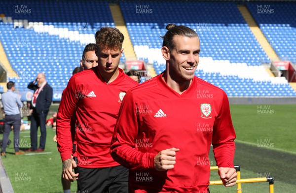 050919 - Wales football training session, Cardiff City Stadium - Wales' Gareth Bale and Joe Rodon in warm up during Wales training session ahead of their Euro Qualifying match against Azerbaijan 