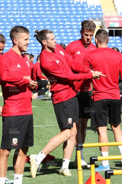 050919 - Wales football training session, Cardiff City Stadium - Wales' Gareth Bale practices a golf swing in warm up during Wales training session ahead of their Euro Qualifying match against Azerbaijan 