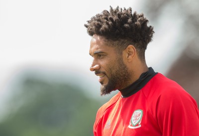 070617 - Wales Football Training Session - Wales' Ashley Williams makes his way down to the training session ahead of the FIFA World Cup Qualifying match against Serbia