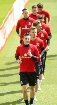 070617 - Wales Football Training Session - The Wales Squad warm up at the start of the training session ahead of the FIFA World Cup Qualifying match against Serbia