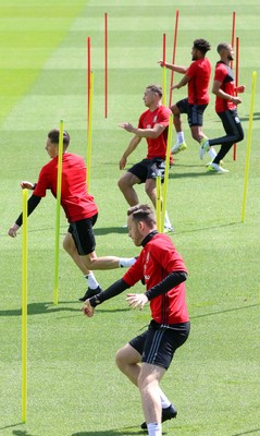 070617 - Wales Football Training Session - The Wales Squad warm up at the start of the training session ahead of the FIFA World Cup Qualifying match against Serbia