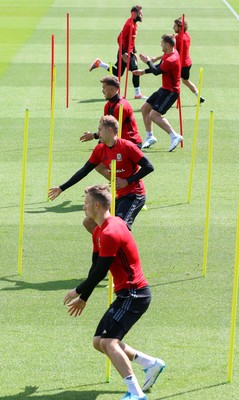 070617 - Wales Football Training Session - The Wales Squad warm up at the start of the training session ahead of the FIFA World Cup Qualifying match against Serbia