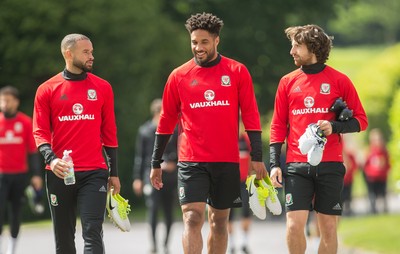 070617 - Wales Football Training Session - Wales' Ashley Richards, Ashley Williams and Joe Allen share a joke during the training session ahead of the FIFA World Cup Qualifying match against Serbia