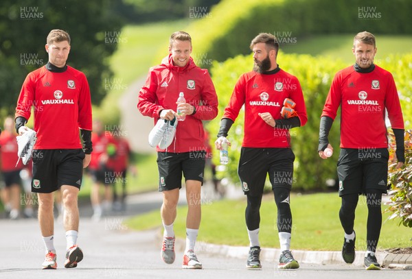 070617 - Wales Football Training Session - Wales' Ben Davies, Chris Gunter, joe Ledley and Aaron Ramsey make their way down to the training session ahead of the FIFA World Cup Qualifying match against Serbia