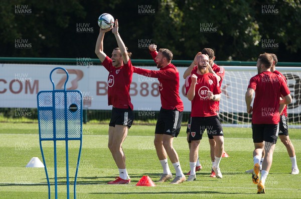 070921 - Wales Football Training Session - Wales' Gareth Bale leads the celebrations as his team wins a challenge during training session ahead of their World Cup Qualifying match against Estonia at the Cardiff City Stadium tomorrow
