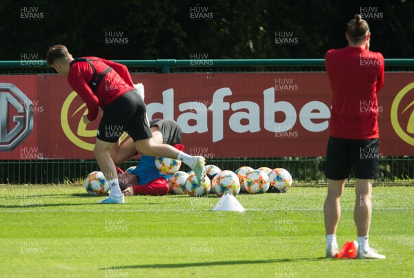 080919 - Wales Football Training session - Wales' Daniel James and Chris Gunter during training session ahead of the International Friendly against Belarus