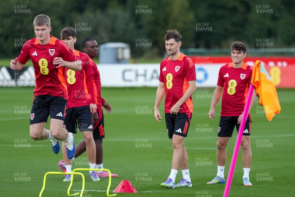 080925 - Wales Football Training - Jordan James, Ben Davies and Daniel James ahead of the international friendly against Canada