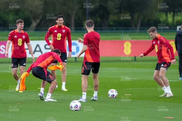 080925 - Wales Football Training - Chris Mepham, Kieffer Moore and David Brooks ahead of the international friendly against Canada