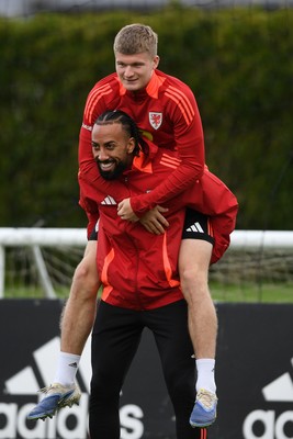 081025 - Wales Football Training - Jordan James and Sorba Thomas of Wales during training ahead of tomorrows friendly match with England