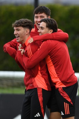 081025 - Wales Football Training - From left to right, Lewis Koumas, Rubin Colwill and Joel Colwill of Wales during training ahead of tomorrows friendly match with England