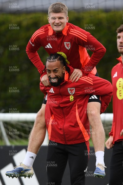 081025 - Wales Football Training - Jordan James and Sorba Thomas of Wales during training ahead of tomorrows friendly match with England