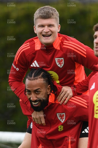 081025 - Wales Football Training - Jordan James and Sorba Thomas of Wales during training ahead of tomorrows friendly match with England