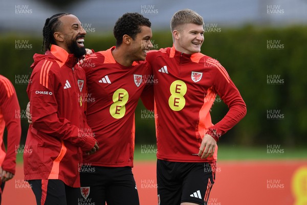 081025 - Wales Football Training - From left to right, Sirba Thomas, Brennan Johnson and Jordan James of Wales during training ahead of tomorrows friendly match with England