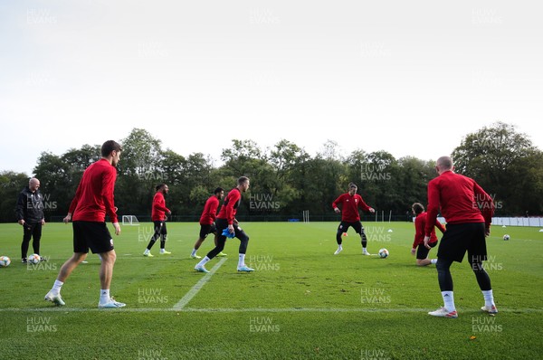 091019 - Wales Football Training session - Wales players warm up during training session ahead of their Euro Qualifying match against Slovakia