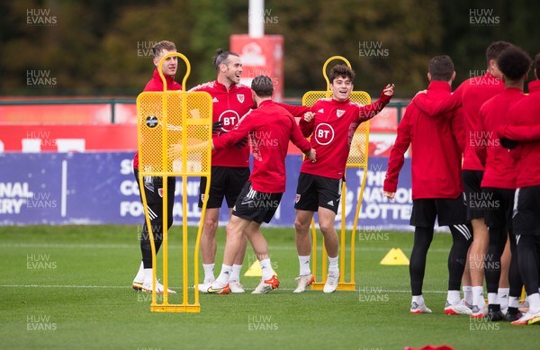 091121 - Wales Football Training - Wales players enjoy a warm up session during a training session ahead of their World Cup Qualifying matches against Belarus and Belgium