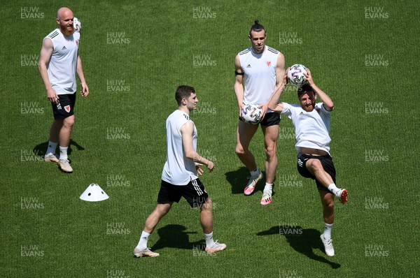 110621 - Wales Football Training at the Baku Olympic Stadium - Jonny Williams, Ben Davies, Gareth Bale and Joe Allen during training