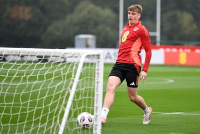 121025 - Wales Football Training - Dylan Lawlor of Wales during a training session ahead of tomorrows World Cup qualifier match against Belgium