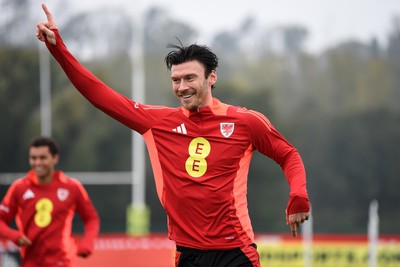 121025 - Wales Football Training - Kieffer Moore of Wales during a training session ahead of tomorrows World Cup qualifier match against Belgium