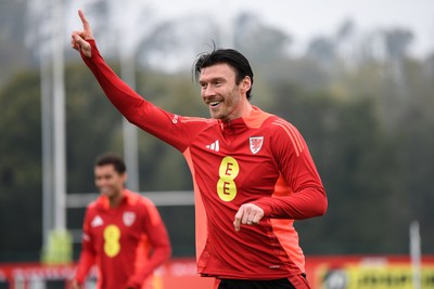 121025 - Wales Football Training - Kieffer Moore of Wales during a training session ahead of tomorrows World Cup qualifier match against Belgium