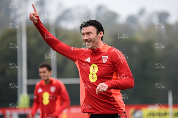 121025 - Wales Football Training - Kieffer Moore of Wales during a training session ahead of tomorrows World Cup qualifier match against Belgium