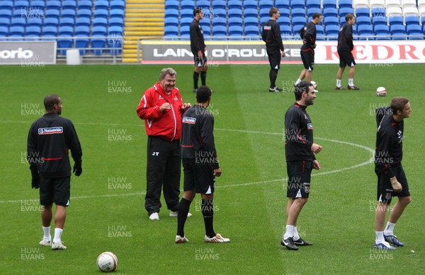 12.11.09... Wales Football Training, Cardiff City Stadium -  Wales manager John Toshack watches his players closely during training session 