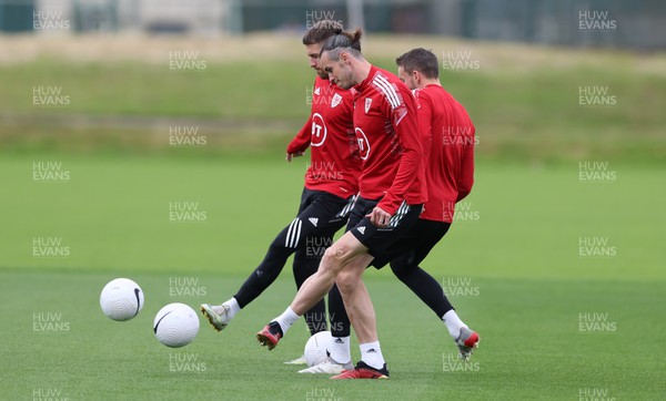 130622 - Wales Football Training Session - Gareth Bale, Chris Gunter and Aaron Ramsey of Wales during training session ahead of the UEFA Nations League match against Netherlands