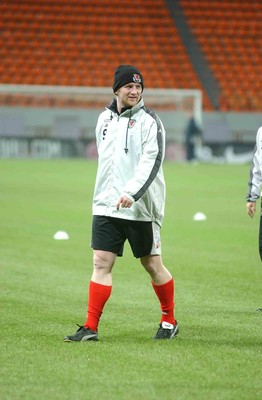 141103 - Wales Football Training - John Hartson in good spirits at the Locomotiv Stadium